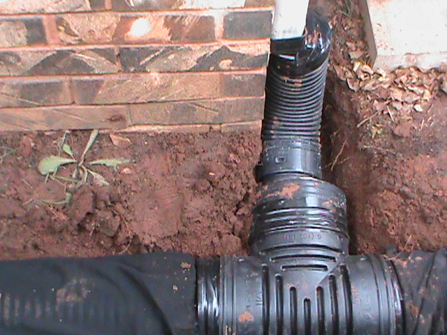 Gutter Downspout Connected to 6 Inch French Drain