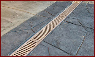A channel drain is one of many types of Surface Drains.