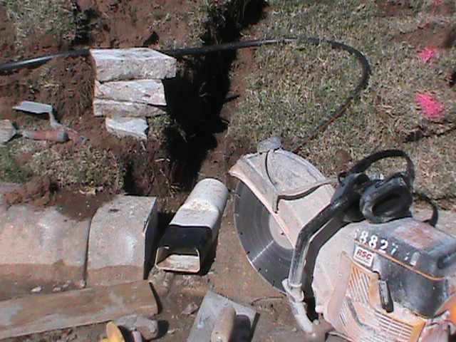 Cutting The Curb and Installing Curb Fitting for French Drain