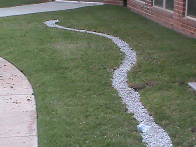 French Drain Running Through Low Areas