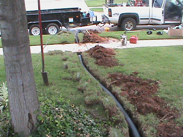 Drainage Pip Running to Street from French Drain in Back Yard