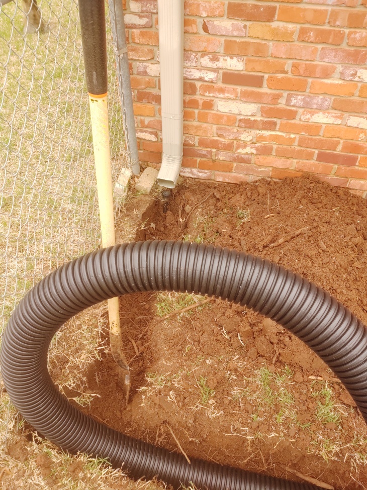 connecting gutter to French Drain